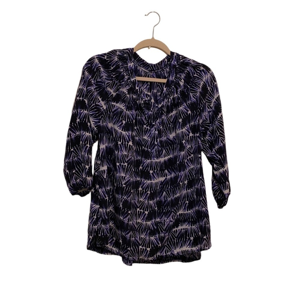 100% Silk blouse.